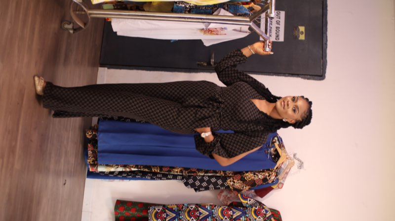 Black patterned wrap jumpsuit coord set in studio by fashion designer Enugu