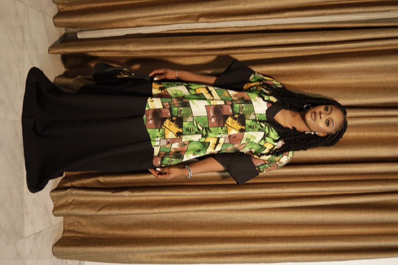 Green and brown Ankara print kaftan maxi dress with gold curtain backdrop by Prom G Fashion Enugu