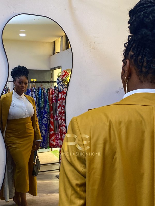 Mustard gold blazer and pencil skirt set with white shirt by best tailor Enugu