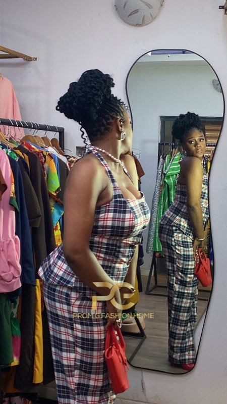 Plaid tartan jumpsuit coord set with red bag by fashion designer Enugu